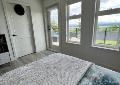 ridge house bedroom with mountain view
